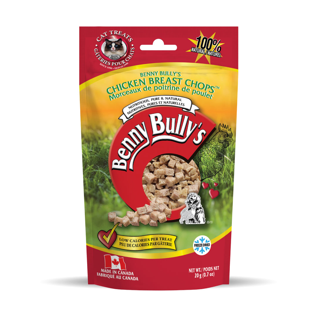 red, green and yellow pouch of cat treats with chicken silhouette on grass